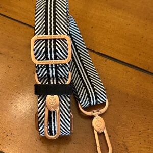 lululemon athletica Black and White cross body bag strap rose gold hardware